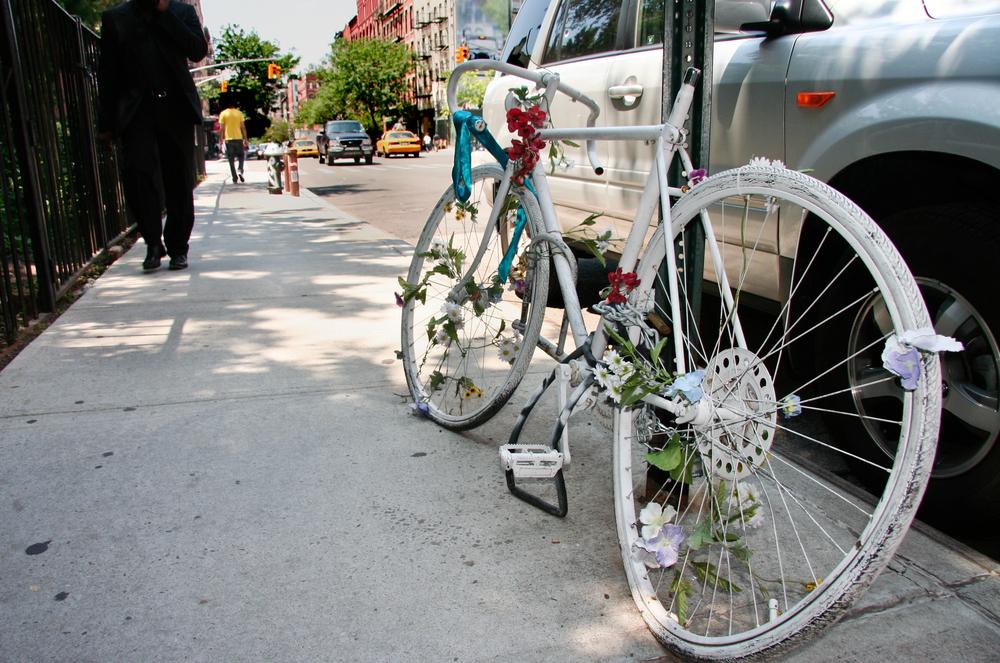 A serious bicycle accident involving a motor vehicle collision.