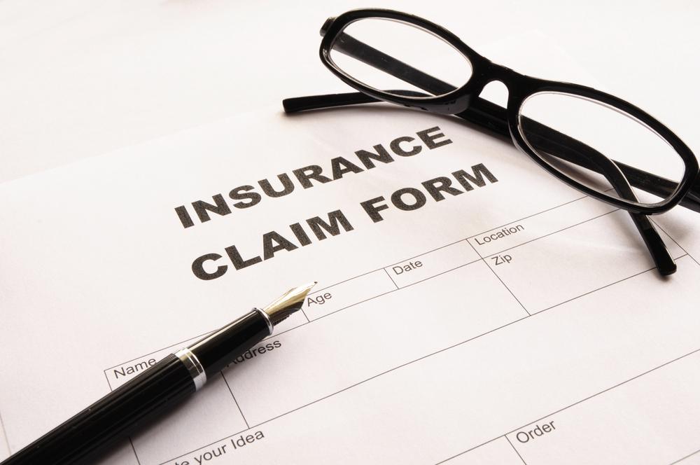 An attorney reviewing a bicycle accident claim involving an underinsured motorist.