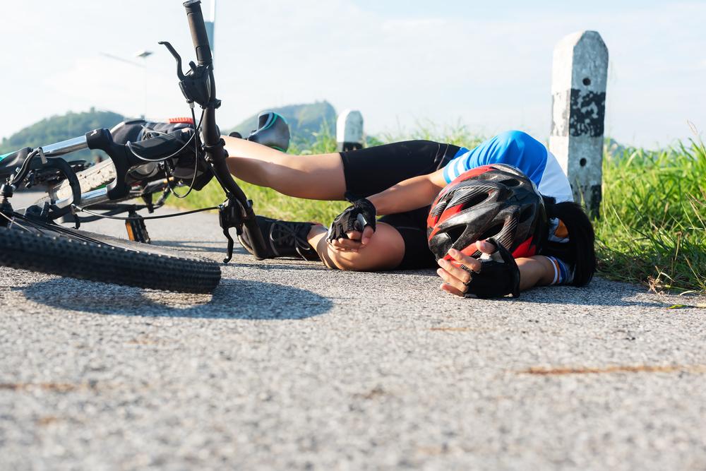 How wearing a bicycle helmet reduces the risk of head injuries in accidents.