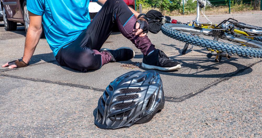 Common bike accident injuries, including fractures, head trauma, and road rash.