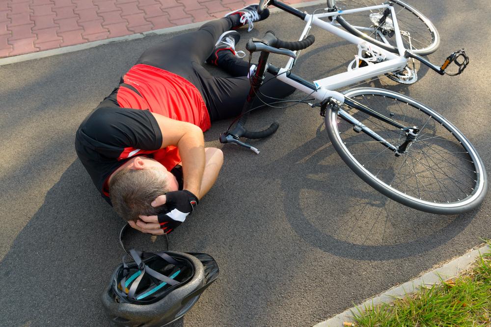 An attorney reviewing a hit-and-run bicycle accident case for an injured cyclist in Chicago.
 