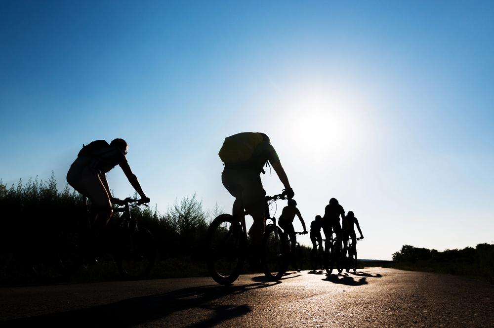 A lawyer discussing legal rights with members of a Chicago bicycling club.