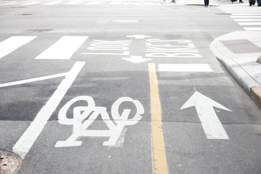 Bike lane marking in Chicago, promoting bicycle safety with clear paths and signs for cyclists, as part of the Chicago Bicycle Safety Guide by experienced Chicago bicycle accident lawyers.
